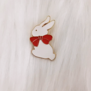 Pin conejo con rosetón